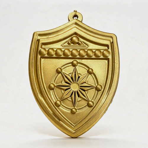 The traitors gold shield - gold,